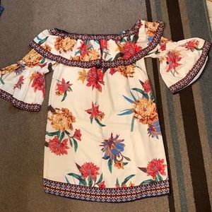 Ladies Small above knee off shoulder dress. I think it fits like a Medium